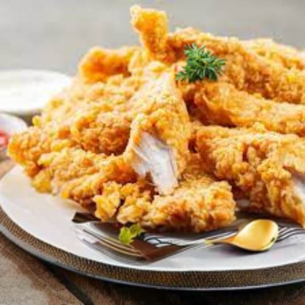 Crunchy chicken spicy snacker with a golden, crispy coating and flavorful seasoning, served hot with a side of dipping sauce