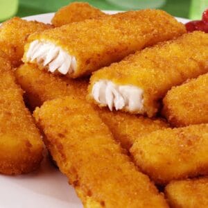 Golden sailfish fingers, breaded and ready to fry or bake, perfect for quick and tasty seafood appetizers